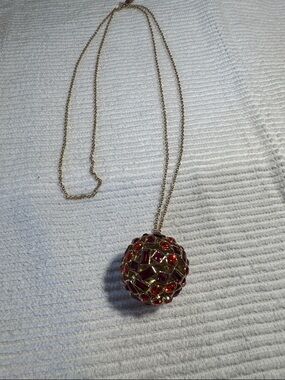 Kate Spade New York Kaleidoball ruby red jeweled ball pendant necklace